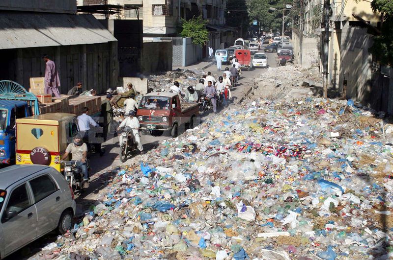 1349892439-garbage-continues-to-flood-streets-after-pickup-resumed-in-karachi_1514120