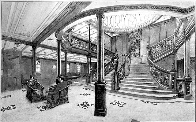 of_the_Grand_Staircase_onboard_the_RMS_Titanic_from_the_1912_promotional_booklet